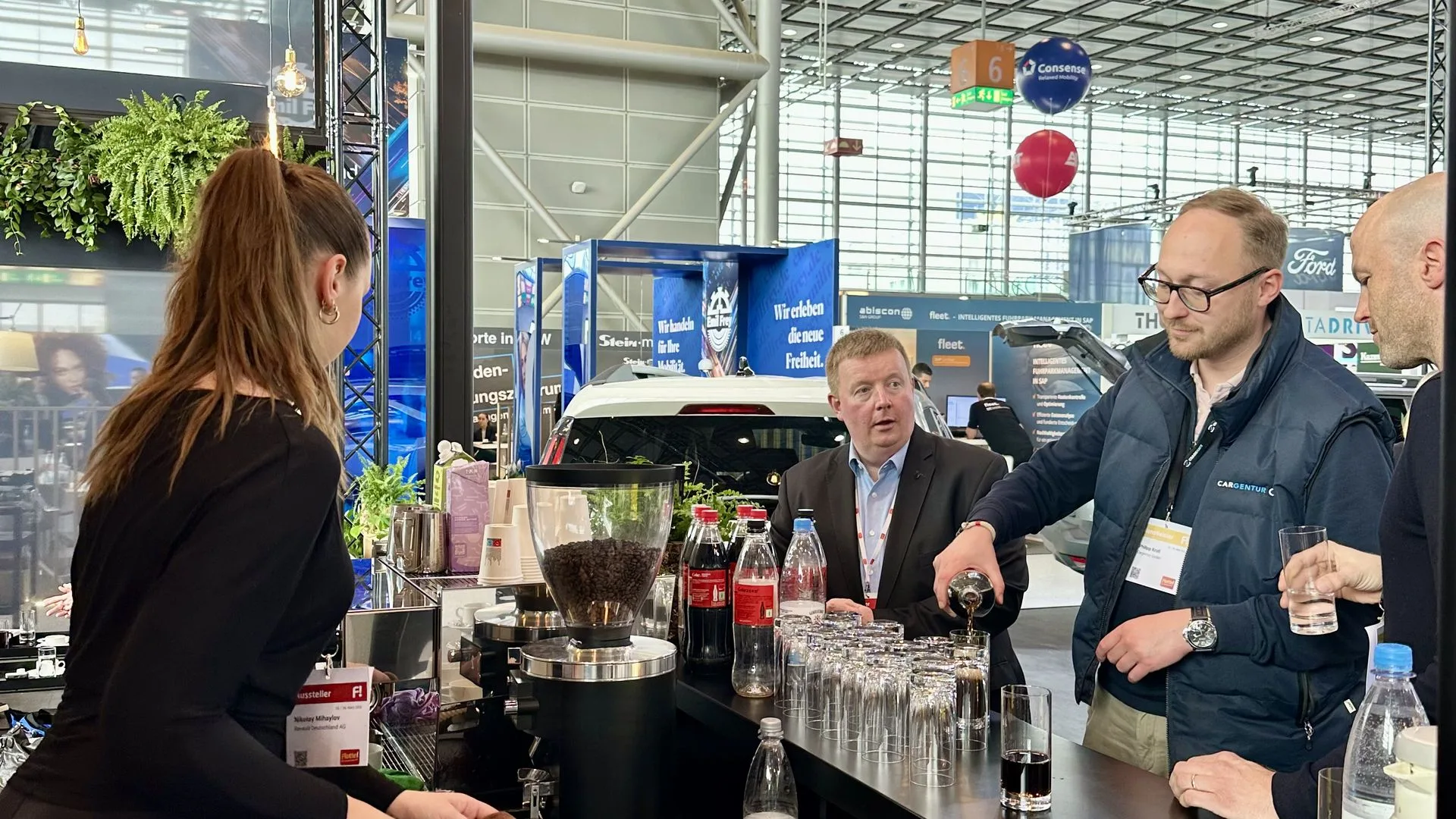 ExpoBARISTI barista serving specialty coffee at a trade fair stand